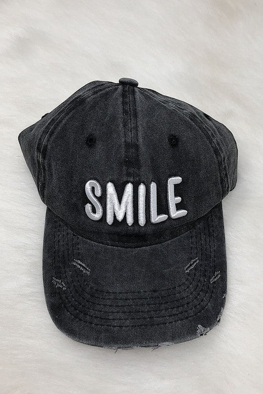 Smile Ball Cap Neutral dark gray distressed base ball cap with white embroidery on the front. - Luminous Bear